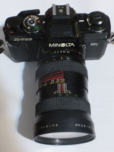 A film camera with a long lens